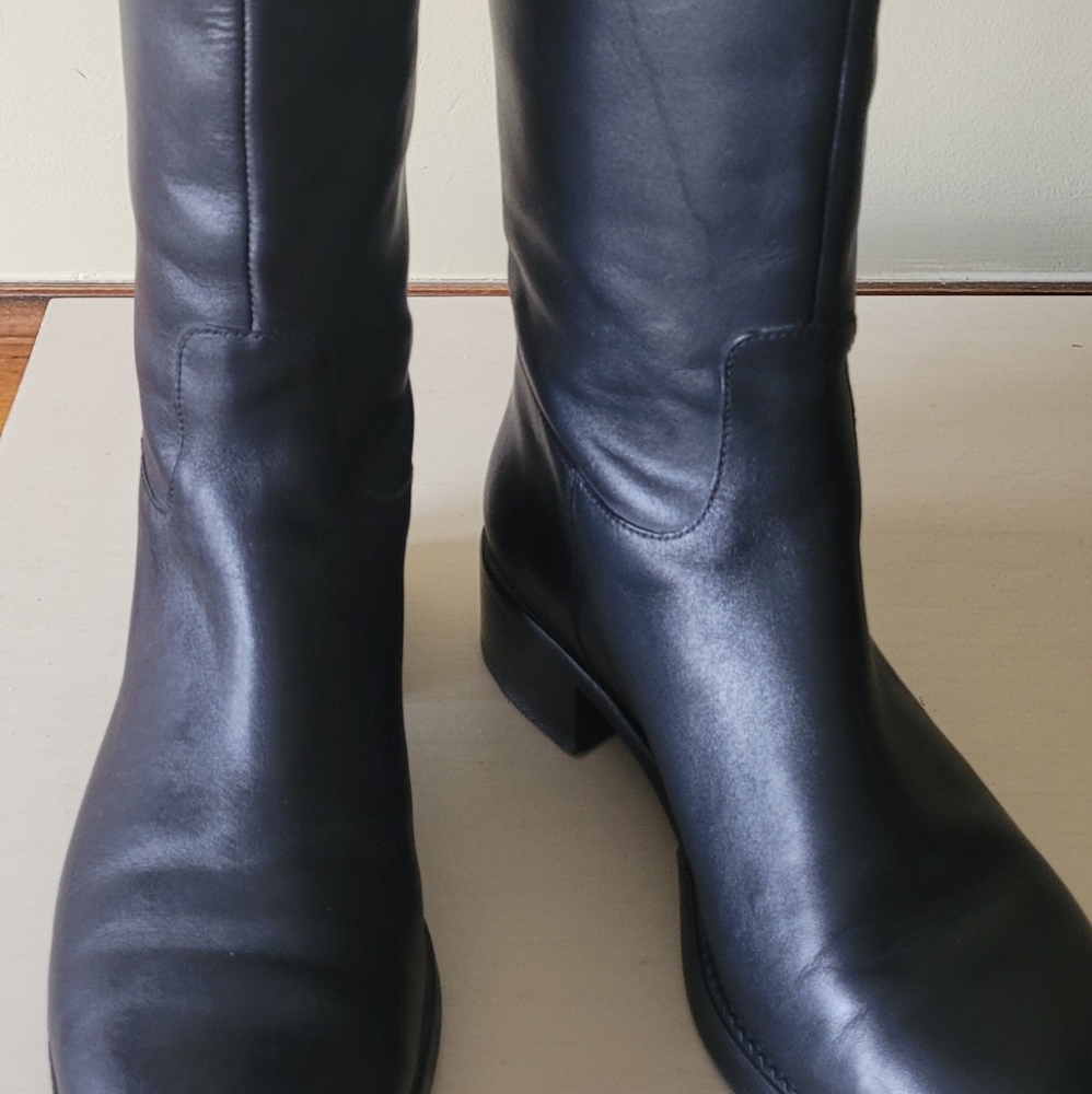 Tory Burch  black leather riding boots.